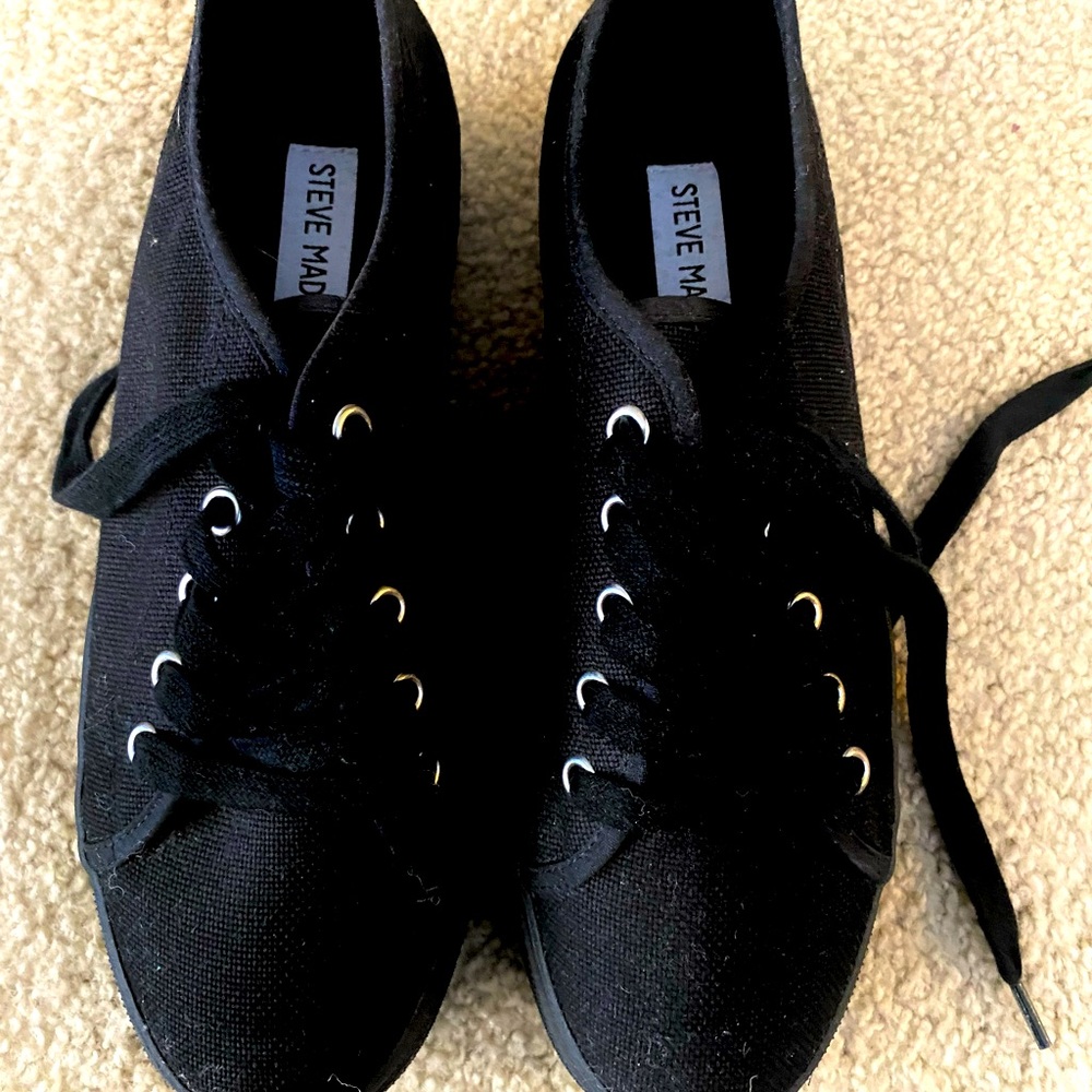 Brand new Steve Madden black high top shoes. Never worn. Size 7